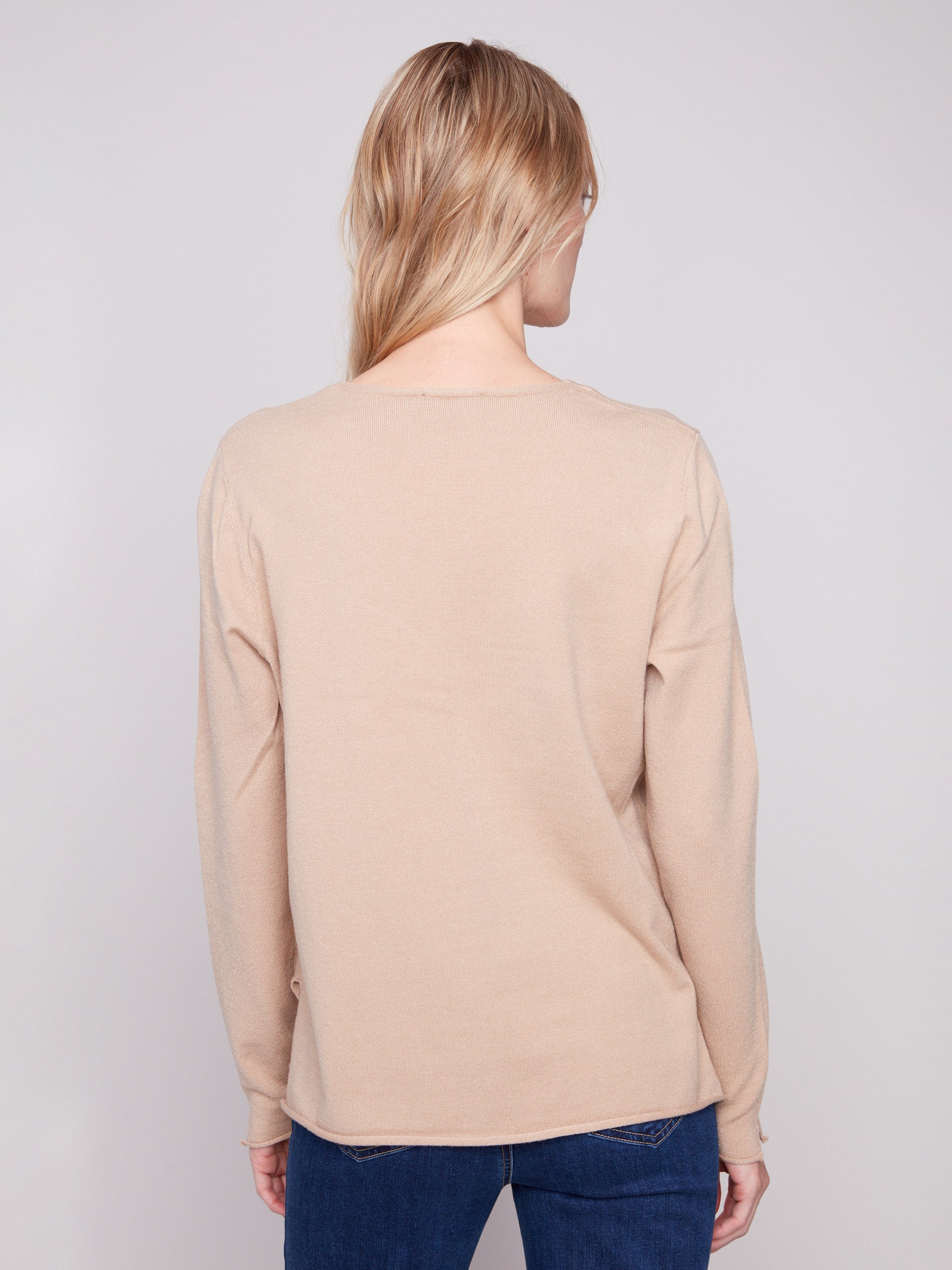 Classic fit sesame sweater featuring stylish side slits on the hem for a modern touch by Charlie B.