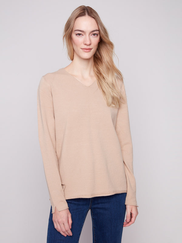 Soft and plush sesame sweater with long sleeves, perfect for any occasion by Charlie B.