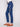 Regular rise indigo denim with five-pocket style and exquisite beaded details along the legs by Charlie B.