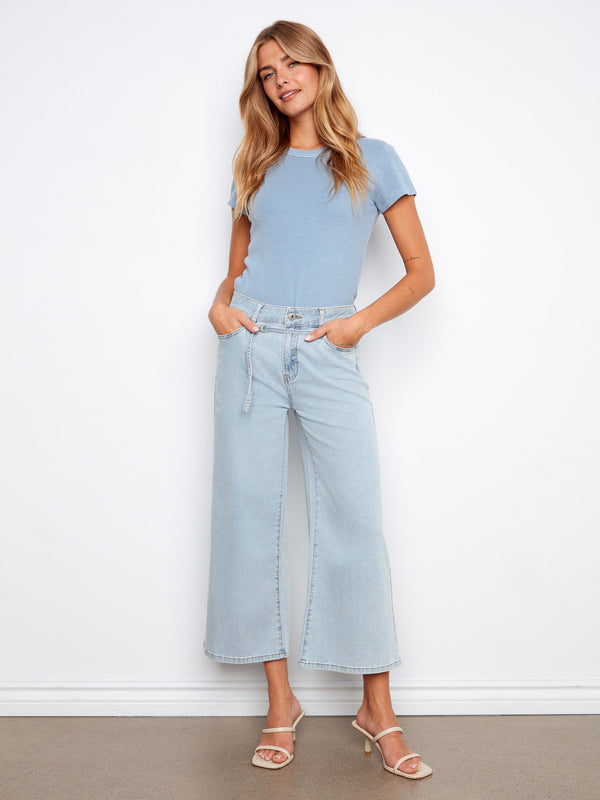 These wide-leg jeans feature a stylish cropped length, perfect for casual outings. The light wash adds a fresh look by Charlie B.