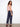 Showcasing slash pockets for practicality, these deep blue denim pants combine fashion and function effortlessly by Charlie B.