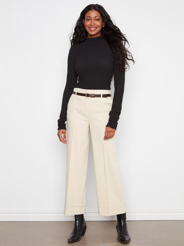 With a belted design, these trousers offer both style and functionality, creating a flattering silhouette. By Charlie B.