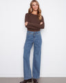 These jeans feature a stylish wide leg, perfect for a modern look. The stretch denim ensures comfort and flexibility by Charlie B.