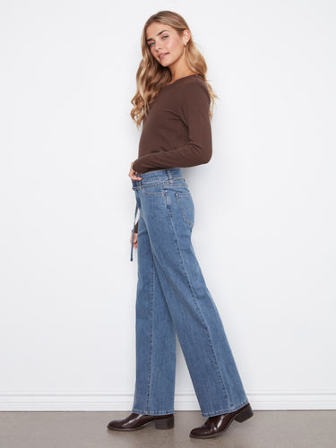 Showcasing a chic belted design, these jeans provide an adjustable fit. Ideal for pairing with various tops and shoes by Charlie B.