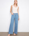These jeans feature a wide leg design, offering a stylish and comfortable fit for any occasion. By Charlie B.