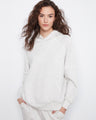 Cozy hoodie with a relaxed fit, perfect for lounging. Features a kangaroo pocket to keep your hands warm. By Charlie B.