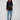 Black blazer featuring a tailored design and single-button closure, perfect for a sleek look by Charlie B.