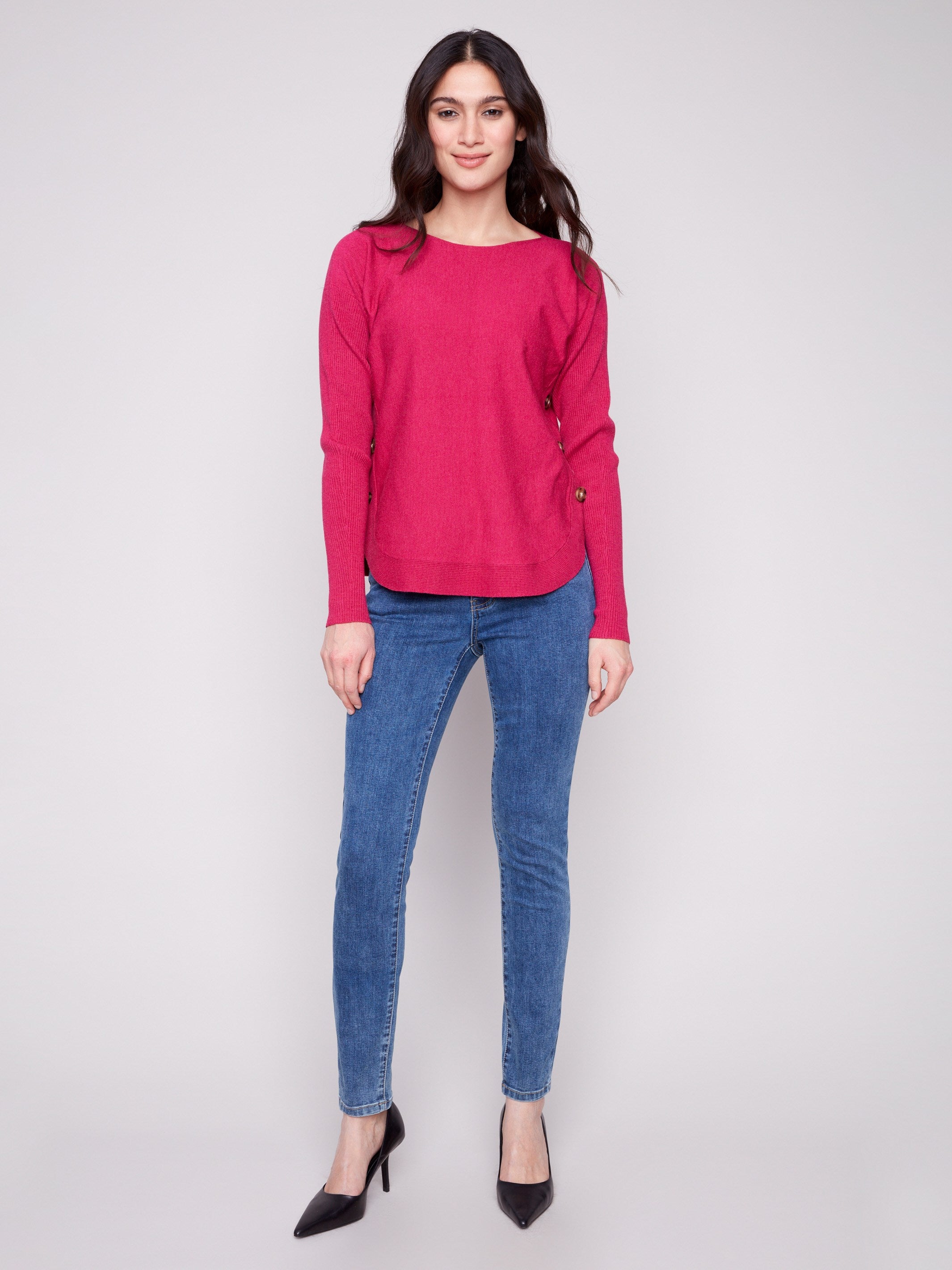 Elegant heather hibiscus sweater featuring a rounded hem for added style and comfort, ideal for versatile wear by Charlie B.