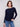 Navy long-sleeve sweater with a stylish boat neck, ideal for adding elegance to any outfit by Charlie B.