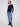 Chic navy sweater featuring side button details, perfect for both casual and formal settings by Charlie B.