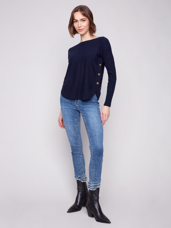 Chic navy sweater featuring side button details, perfect for both casual and formal settings by Charlie B.