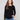 Elegant black sweater featuring a boat neck design, ideal for versatile styling by Charlie B.