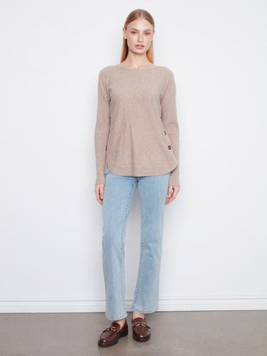 Casual yet refined sweater showcasing a rounded hemline, perfect for any occasion by Charlie B.