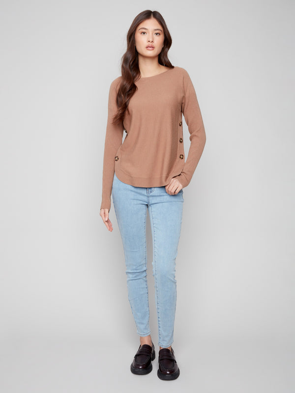 Chic truffle sweater with rounded hem detailing, offering both comfort and style for daily wear by Charlie B.