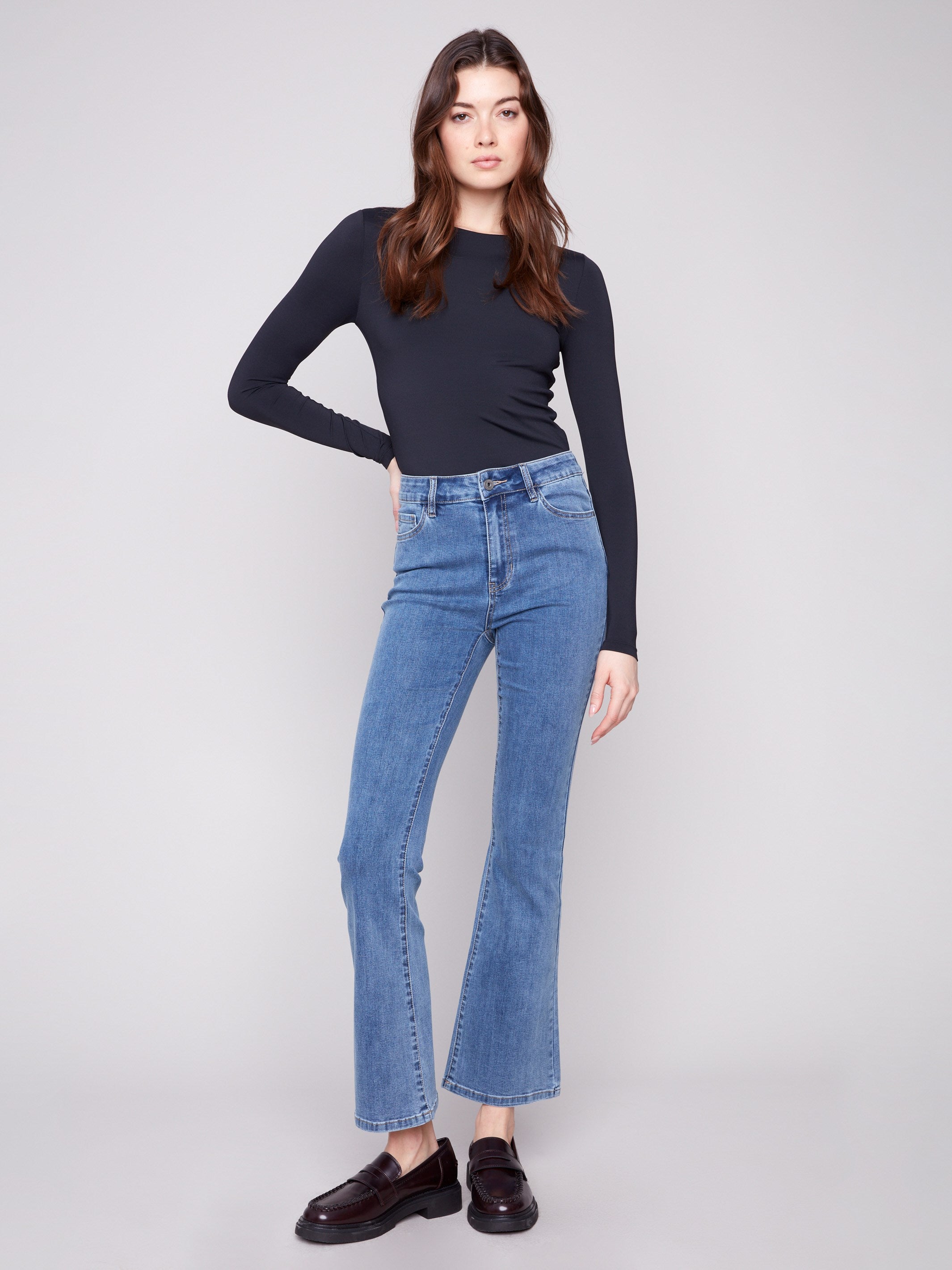 These jeans feature a bootcut fit, perfect for pairing with your favorite shoes by Charlie B.