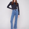 These jeans feature a bootcut fit, perfect for pairing with your favorite shoes by Charlie B.