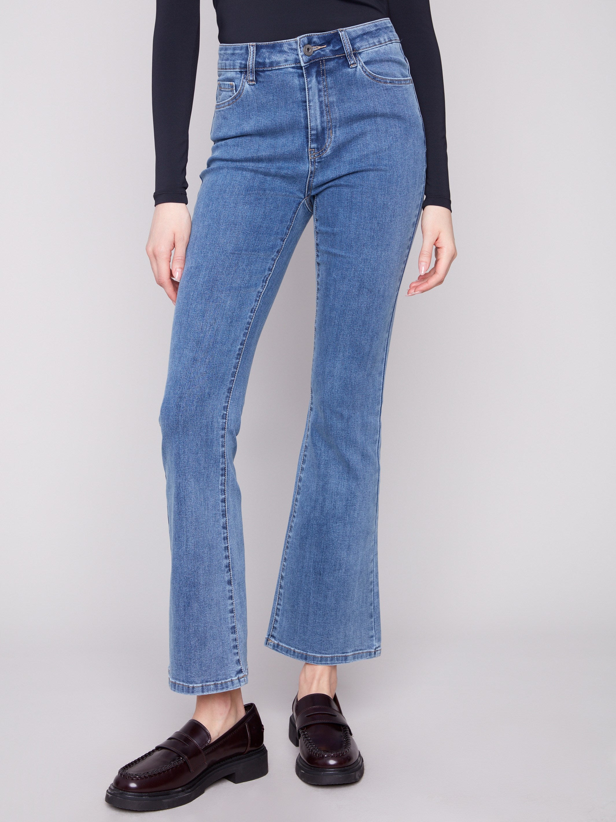 Crafted from stretch denim material, these jeans offer comfort and style by Charlie B.