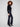 Classic five-pocket design adds functionality to these chic deep blue jeans by Charlie B.