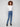 Medium blue jeans featuring a classic bootcut fit, perfect for versatile styling by Charlie B.