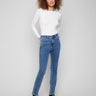 Medium blue jeans featuring a classic bootcut fit, perfect for versatile styling by Charlie B.