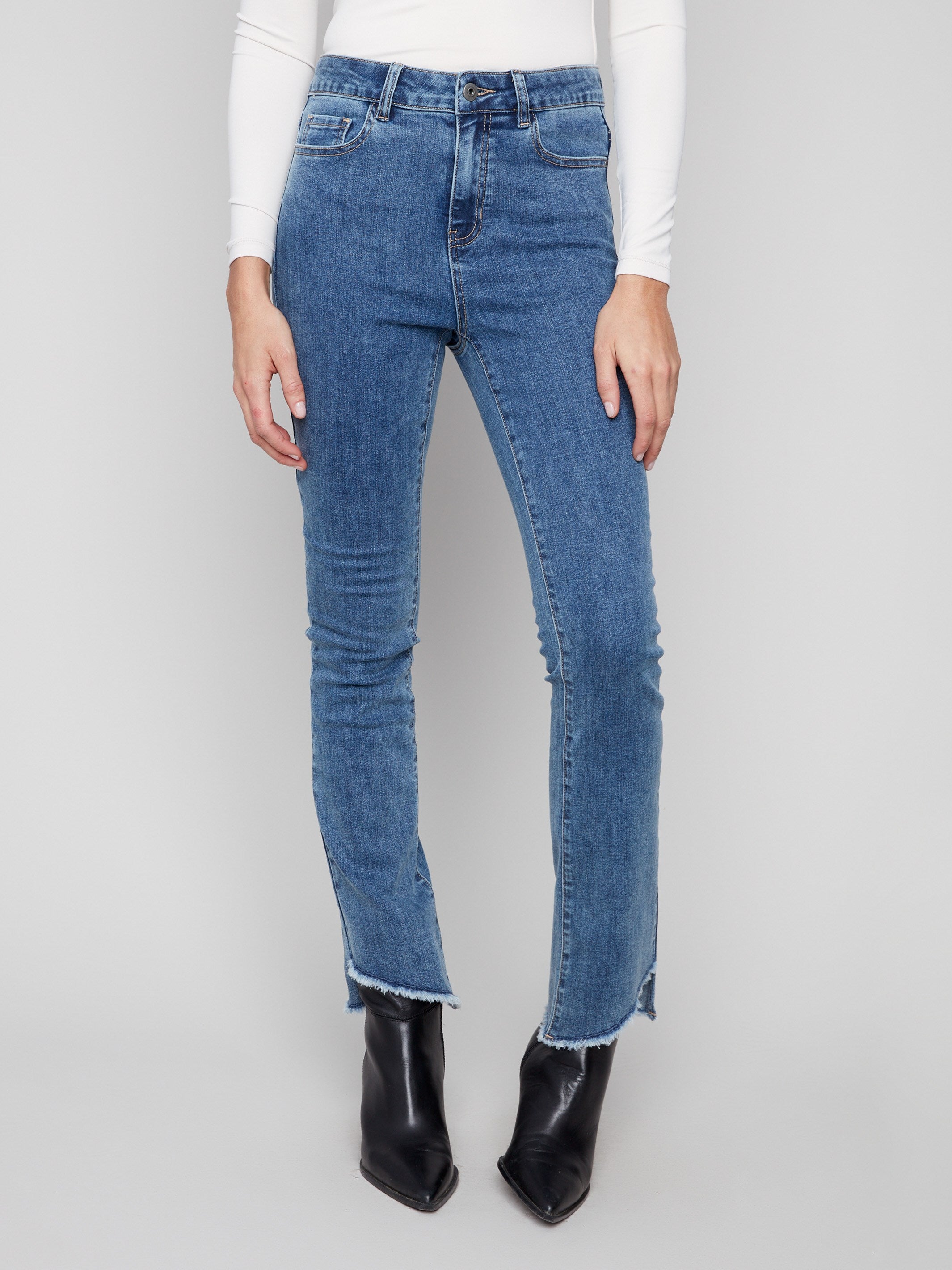 Stretch denim jeans in medium blue with a comfortable regular rise for everyday wear by Charlie B.