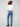Medium blue jeans with an asymmetrical fringed hem for a trendy touch by Charlie B.