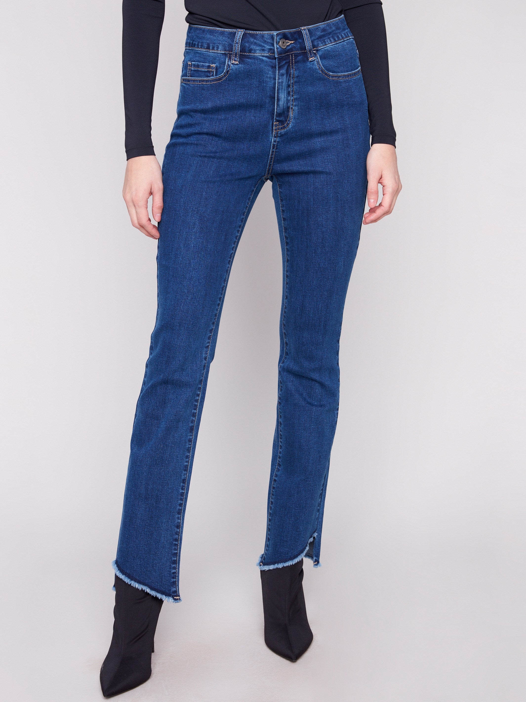 Indigo jeans with a long length and five-pocket design, crafted in soft stretch denim by Charlie B.