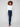 Blue-black jeans crafted from stretch denim material, offering a comfortable bootcut fit with stylish gem buttons by Charlie B.