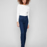 Blue-black jeans crafted from stretch denim material, offering a comfortable bootcut fit with stylish gem buttons by Charlie B.