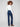 Crafted in stretch denim, these blue-black jeans provide flexibility and comfort with unique snap button details by Charlie B.