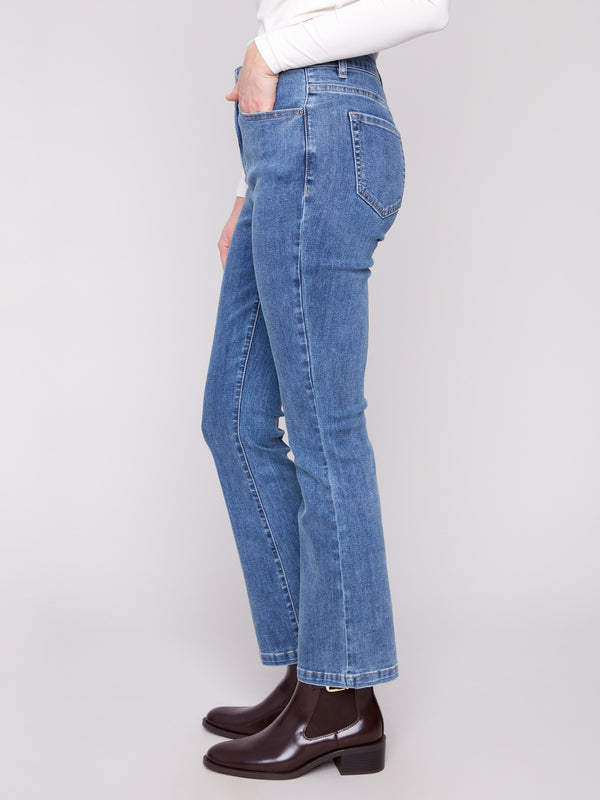Stylish five-pocket design enhances the classic look of these medium blue bootcut jeans by Charlie B.