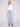 Light blue denim pants featuring a flattering bootcut fit and stylish design by Charlie B.