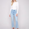 Light blue denim pants featuring a flattering bootcut fit and stylish design by Charlie B.