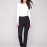 Black twill pants featuring a bootcut fit and regular rise, perfect for versatile styling by Charlie B.