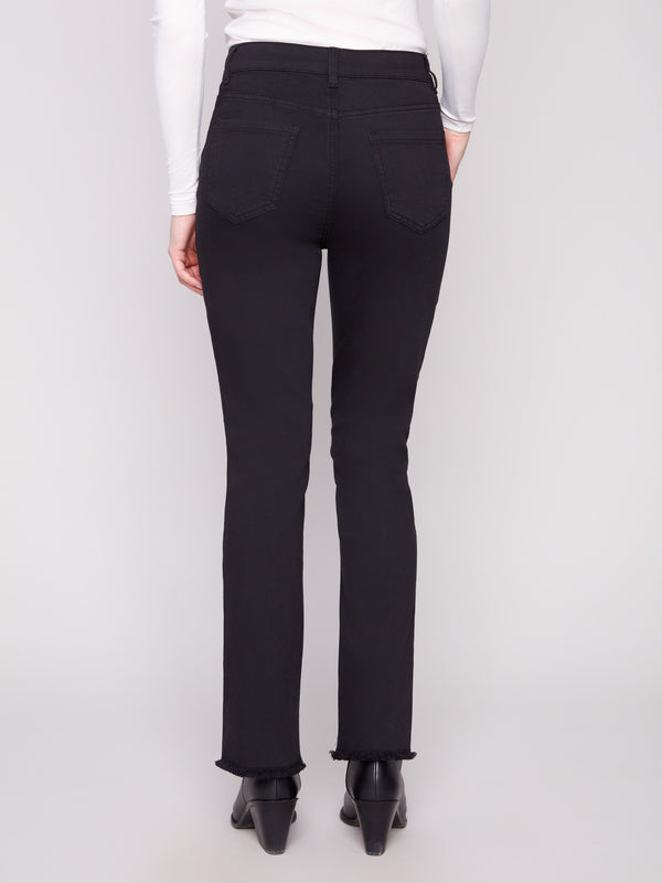 Designed with a classic five-pocket style, these black twill pants offer functionality and fashion by Charlie B.