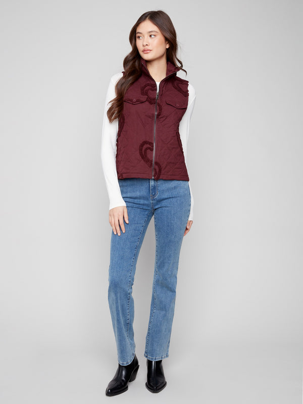 Quilted cabernet vest adorned with unique boucle details, combining comfort and style by Charlie B.