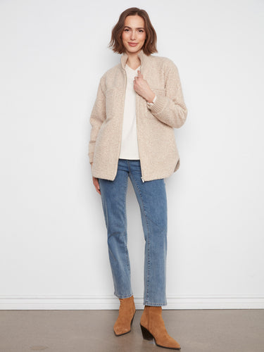 Designed with a ribbed stand collar, this jacket adds a touch of elegance to any outfit. By Charlie B.