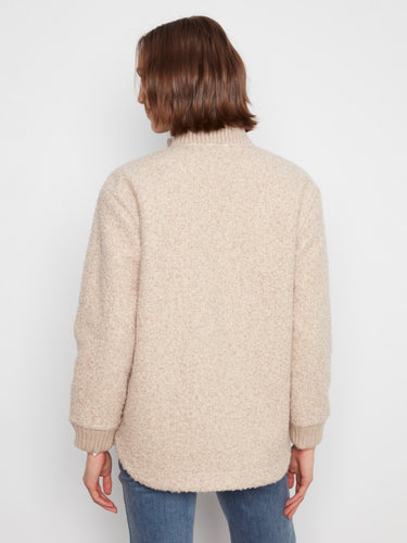 Equipped with chest pockets, this jacket combines functionality with trendy design. By Charlie B.