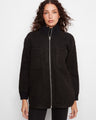 The coat features a convenient zip-front closure, adding functionality and style to your wardrobe. By Charlie B.