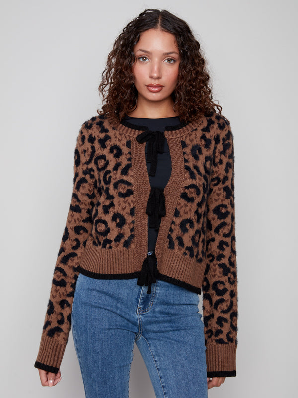 Animal print cardigan with plushy texture, featuring a stylish bow tie closure by Charlie B.