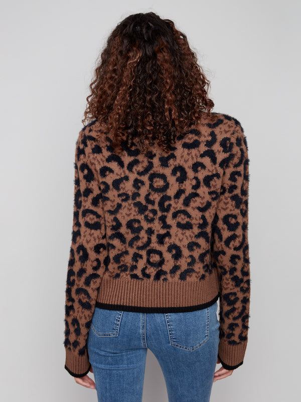Cardigan features ribbed cuffs for added comfort and style, perfect for any occasion by Charlie B.