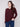 Fashionable cabernet crew neck sweater adorned with a striking braided 'Love' detail and stylish drop shoulders for flair by Charlie B.