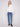 Stylish ecru sweater with long sleeves and a delightful braided 'Love' detail, perfect for cozy days by Charlie B.