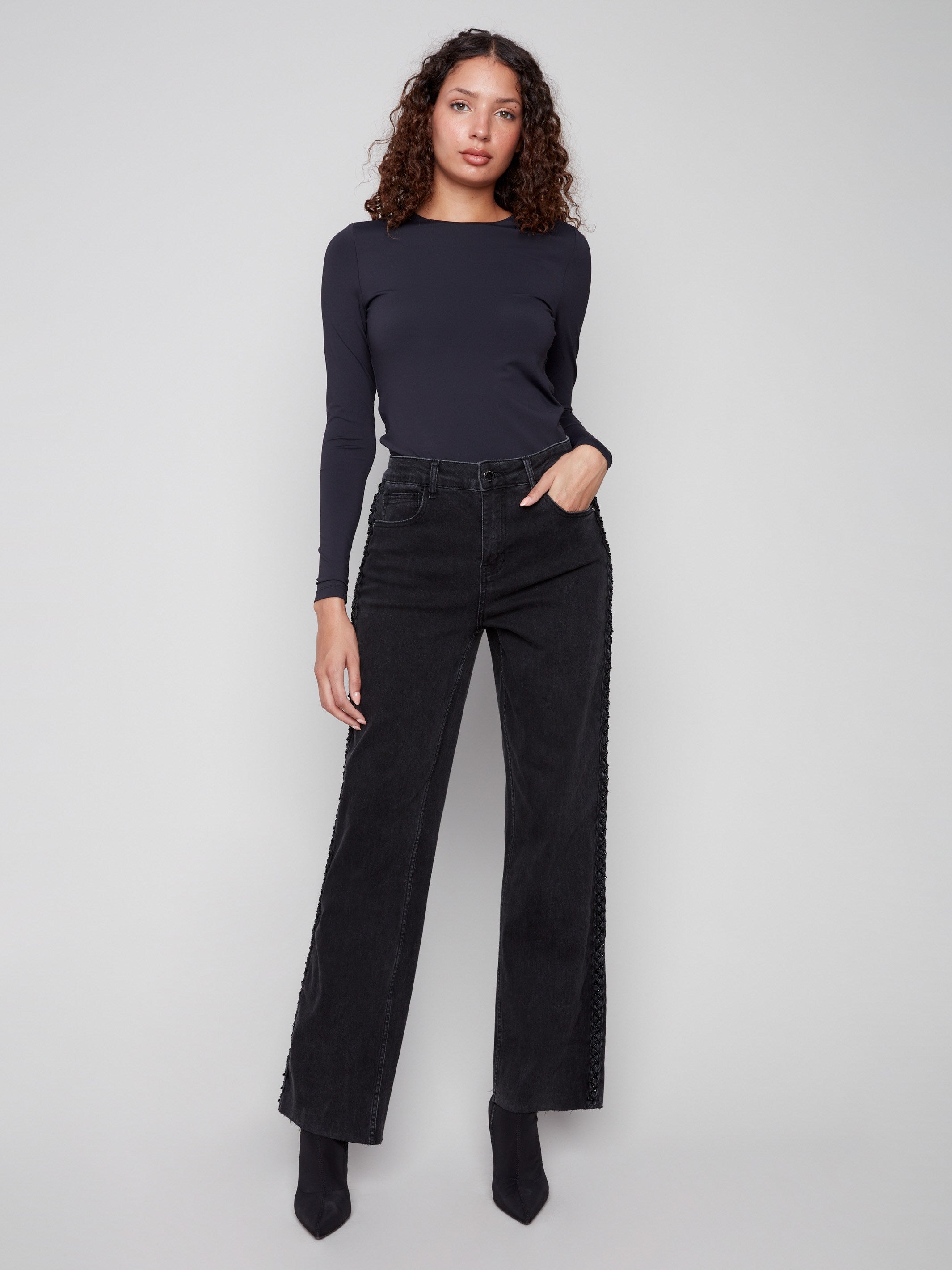 Charcoal jeans featuring a regular rise and crafted from stretch denim material, offering comfort and style by Charlie B.