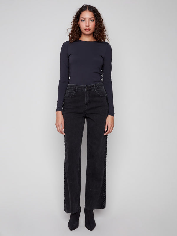 Crafted in stretch denim, these charcoal straight leg jeans ensure flexibility and ease of movement by Charlie B.
