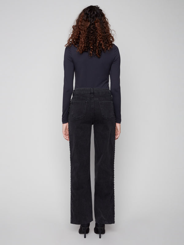 The braided side seam adds an elegant touch to these regular rise charcoal denim jeans by Charlie B.
