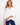 White blouse with long roll-up sleeves and a front knot, crafted from 100% cotton for comfort and style by Charlie B.