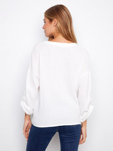 Casual yet refined white blouse with long roll-up sleeves in premium 100% cotton material by Charlie B.