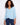 Light blue blouse with a stylish notch neckline and long roll-up sleeves, crafted from 100% cotton for comfort by Charlie B.