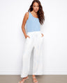White and blue striped pants featuring a wide fit with slash pockets, perfect for casual wear by Charlie B.